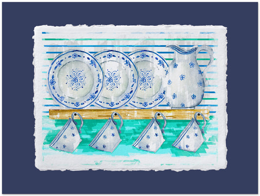 Set of blue and white ceramic dishes on a textured surface with a blue background